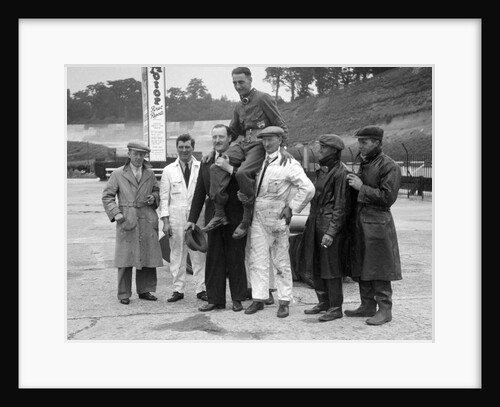 Leon Cushman being carried aloft after making a successful speed record attempt, Brooklands, 1931 by Bill Brunell