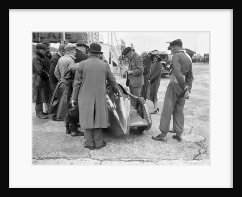 People examining Leon Cushman's Austin 7 racer at Brooklands for a speed record attempt, 1931 by Bill Brunell