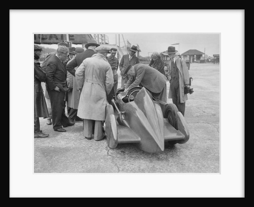 People examining Leon Cushman's Austin 7 racer at Brooklands for a speed record attempt, 1931 by Bill Brunell