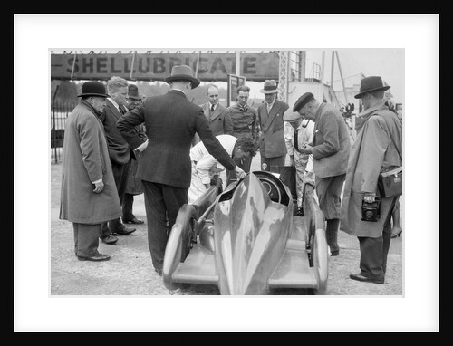 People examining Leon Cushman's Austin 7 racer at Brooklands for a speed record attempt, 1931 by Bill Brunell