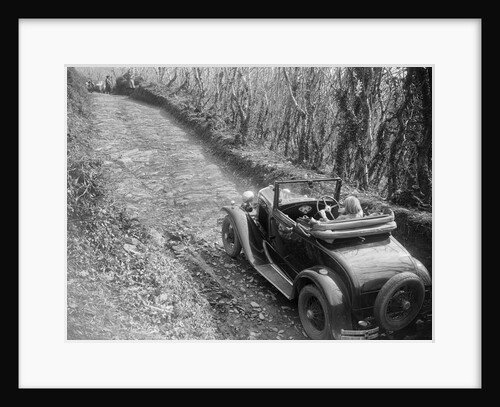 Kitty Brunell driving a 1930 Ford Model A 2-seater, 1931 by Bill Brunell