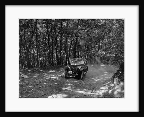 Morris Minor competing in the B&HMC Brighton-Beer Trial, Fingle Bridge Hill, Devon, 1934 by Bill Brunell
