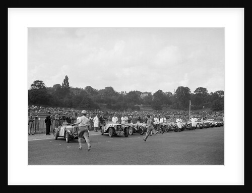 Drivers running to their cars at the start of the Imperial Trophy race, Crystal Palace, 1939 by Bill Brunell