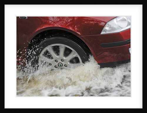 Car driving through flood by Unknown