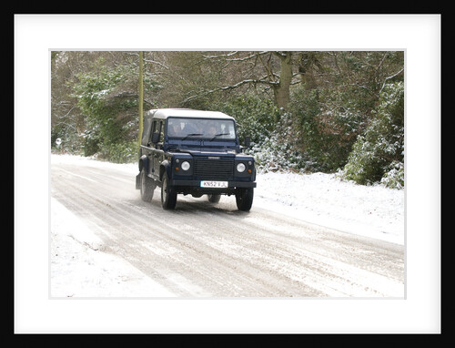 2002 Land Rover Defender driving on snowy road, 2009 by Unknown