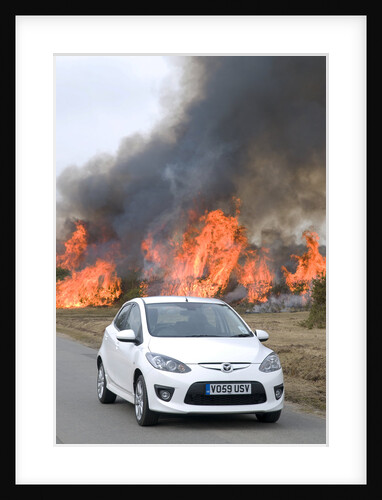 2010 Mazda 2 Sport, controlled burning in New Forest by Unknown