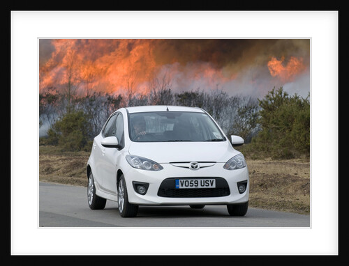 2010 Mazda 2 Sport, controlled burning in New Forest by Unknown