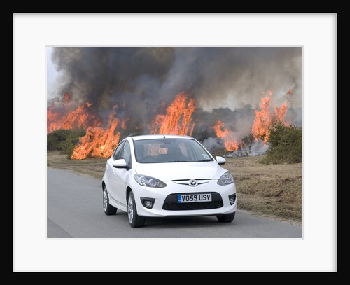 2010 Mazda 2 Sport, controlled burning in New Forest by Unknown