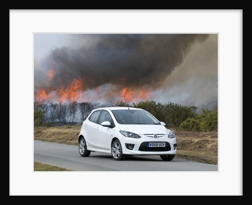 2010 Mazda 2 Sport, controlled burning in New Forest by Unknown