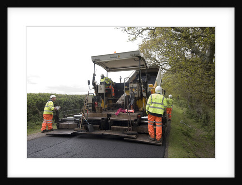 Road resurfacing work repairing potholes by Unknown