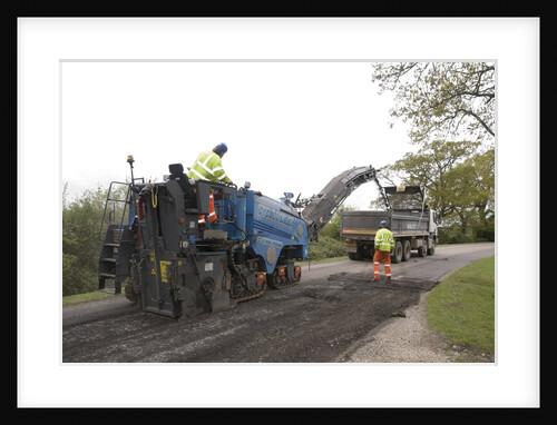 Road resurfacing work repairing potholes by Unknown