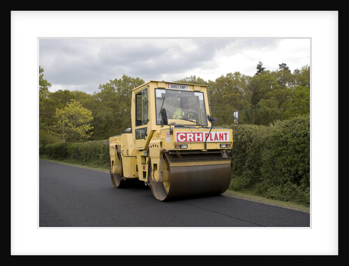 Road resurfacing work repairing potholes by Unknown