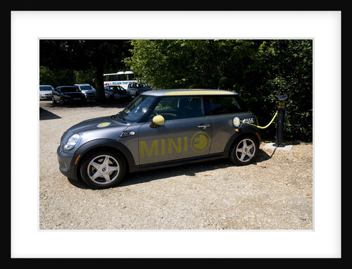 Electric Mini at battery charging point 2011 by Unknown