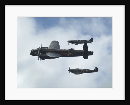 2011 Goodwood Revival Meeting, Lancaster bomber and 2 Spitfires in aerial display by Unknown
