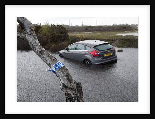 Ford Focus in flooded ditch after losing control on wet road 2012 by Unknown