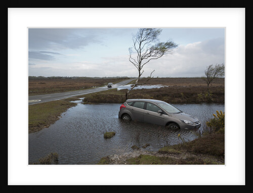 Ford Focus in flooded ditch after losing control on wet road 2012 by Unknown