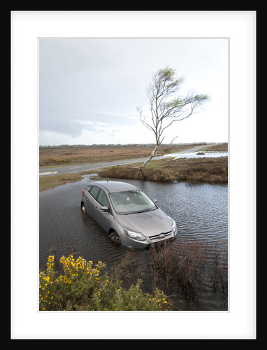 Ford Focus in flooded ditch after losing control on wet road 2012 by Unknown