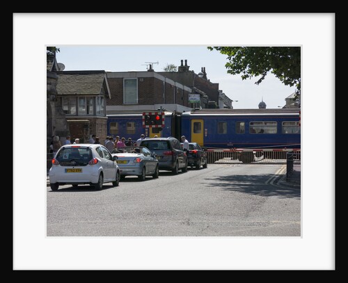 Train passing through level crossing in Lincoln 2014 by Unknown