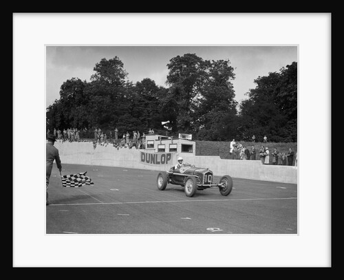 Alfa Romeo of Kenneth Evans taking the chequered flag at Crystal Palace, 1939 by Bill Brunell