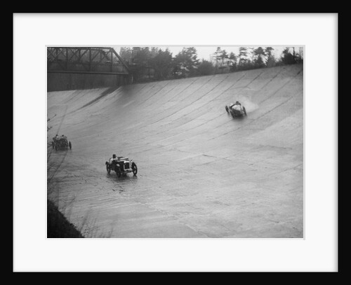 Austin 7 and the spinning Riley of HL Roberts, BARC Mountain Race, Brooklands, Surrey, 1931 by Bill Brunell