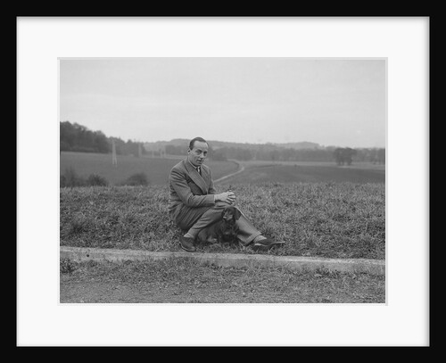 British racing driver Charles Mortimer and his pet dachshund, c1930s by Bill Brunell