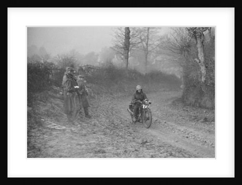 Woman riding a Royal Enfield motorcycle in the Gloucester Trial, c1930s by Bill Brunell