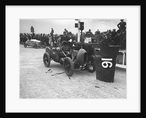 Leon Cushman working on his Bugatti Brescia at the JCC 200 Mile Race, Brooklands, Surrey, 1922 by Bill Brunell