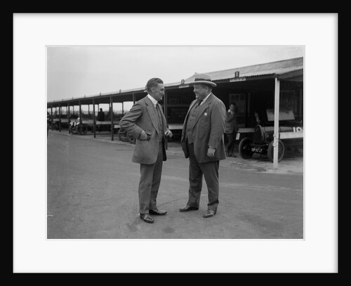 Two men chatting at Brooklands motor racing circuit, Surrey, 1920s by Bill Brunell