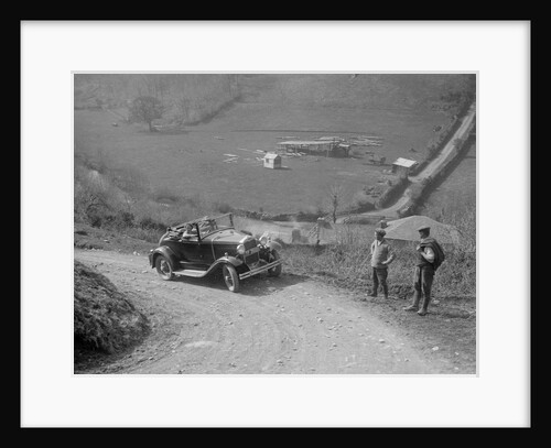 Kitty Brunell driving a 1930 2-seater Ford Model A, 1931. by Bill Brunell