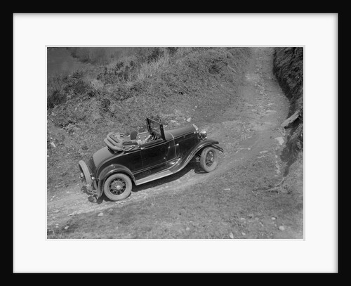 Kitty Brunell driving a 1930 2-seater Ford Model A, 1931. by Bill Brunell