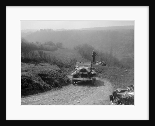 Kitty Brunell driving a 1930 2-seater Ford Model A, 1931. by Bill Brunell
