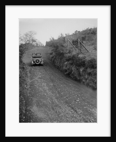 Kitty Brunell driving a 1930 2-seater Ford Model A, 1931. by Bill Brunell