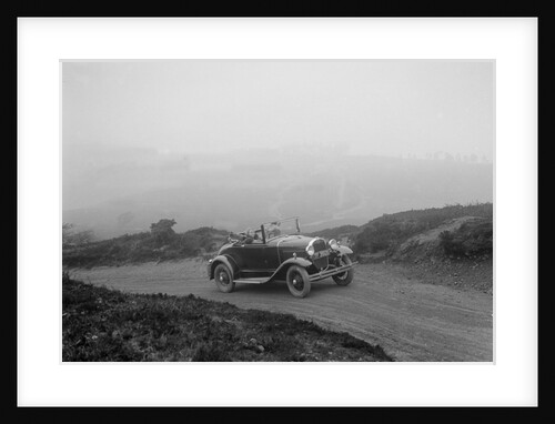 Kitty Brunell driving a 1930 2-seater Ford Model A, 1931. by Bill Brunell