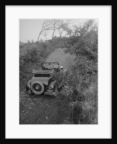 Kitty Brunell driving a 1930 2-seater Ford Model A, 1931. by Bill Brunell