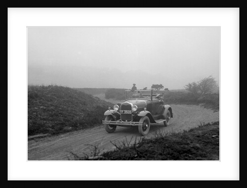 Kitty Brunell driving a 1930 2-seater Ford Model A, 1931. by Bill Brunell