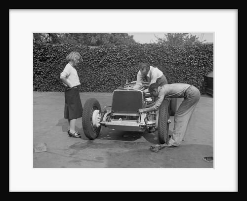 Working on the engine of Raymond Mays' Vauxhall-Villiers, c1930s by Bill Brunell