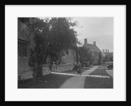 Unidentified 4-seater tourer in a village, c1920s by Bill Brunell