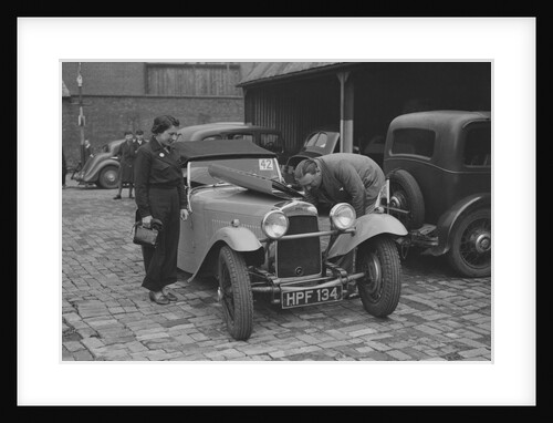 AES Curtis looking under the bonnet of his HRG at the RAC Rally, 1939 by Bill Brunell