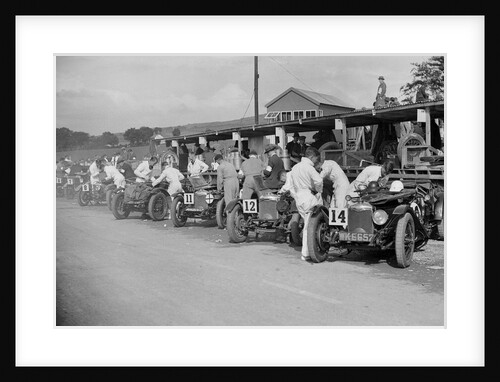 Triumph and Riley cars in the pits at the RAC TT Race, Ards Circuit, Belfast, 1929 by Bill Brunell