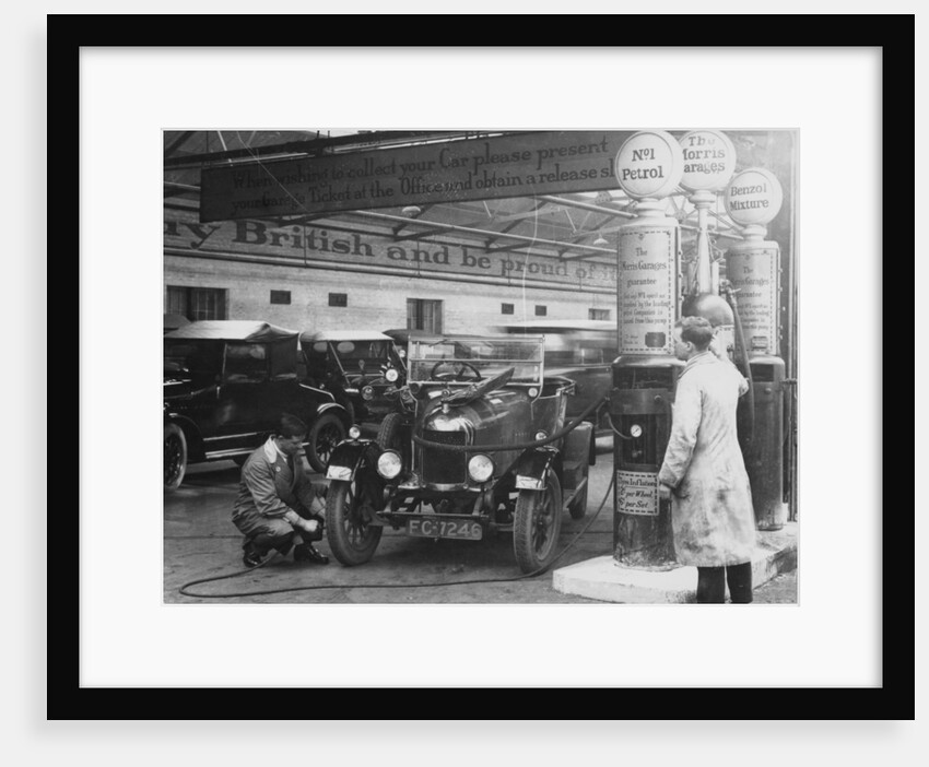Morris Cowley Bullnose in a garage, 1925 by Unknown