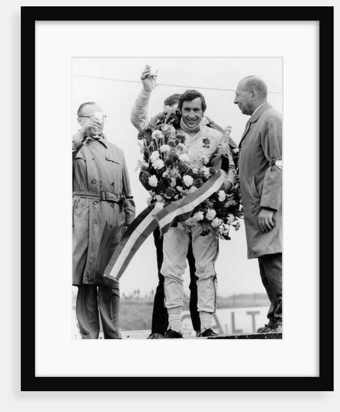 Jackie Stewart, celebrating victory at The Dutch Grand Prix, Zandvoort, 1968 by Unknown