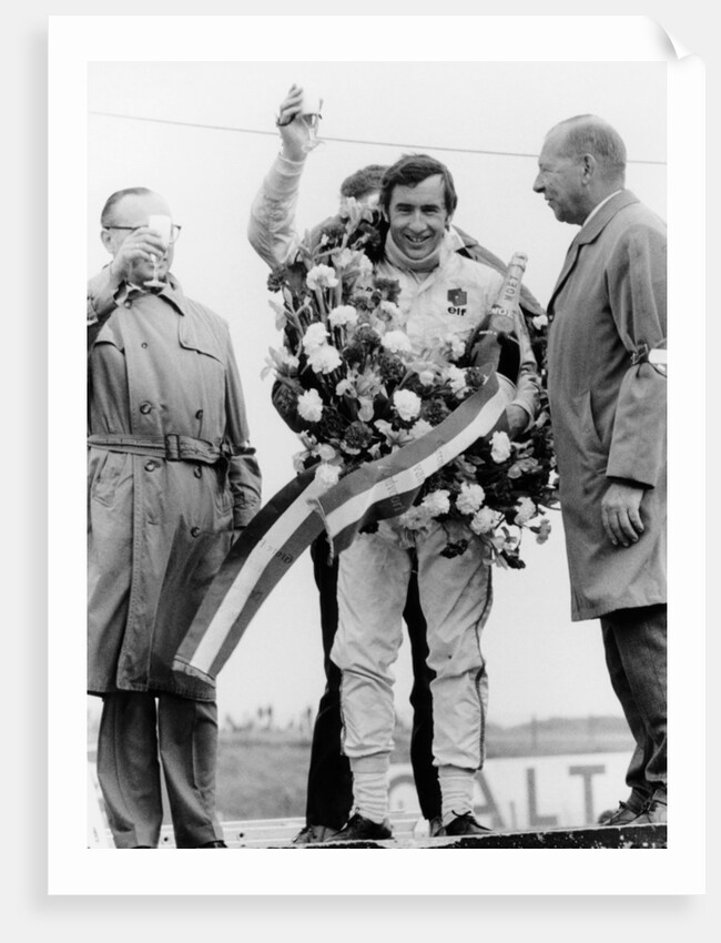 Jackie Stewart, celebrating victory at The Dutch Grand Prix, Zandvoort, 1968 by Unknown