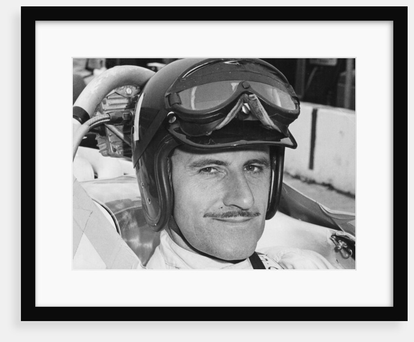 Graham Hill in cockpit of Lola T90, Indianapolis, 1966 by Unknown