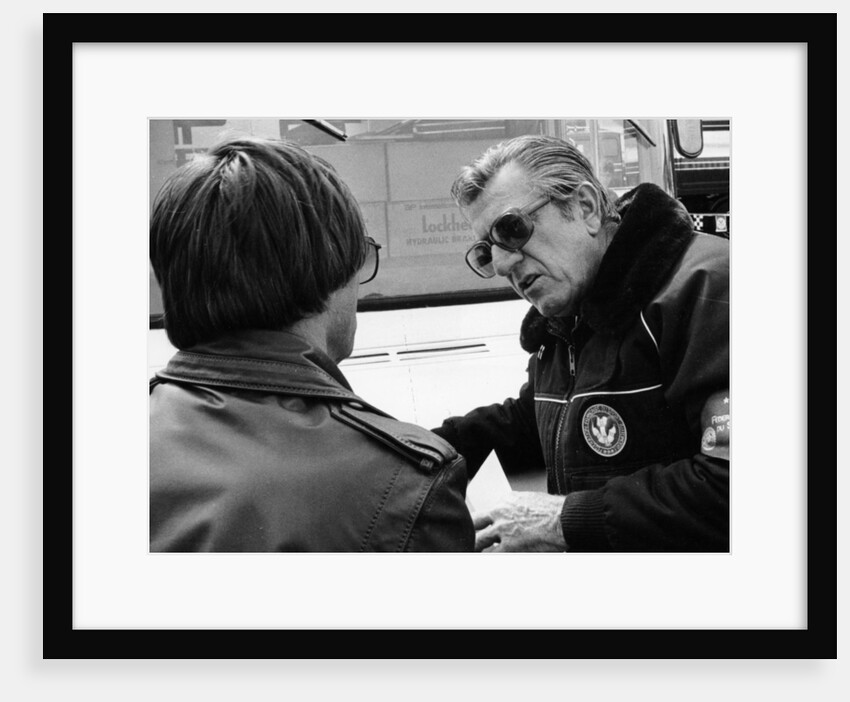 Jean-Marie Balestre speaking to Bernie Ecclestone by Anonymous