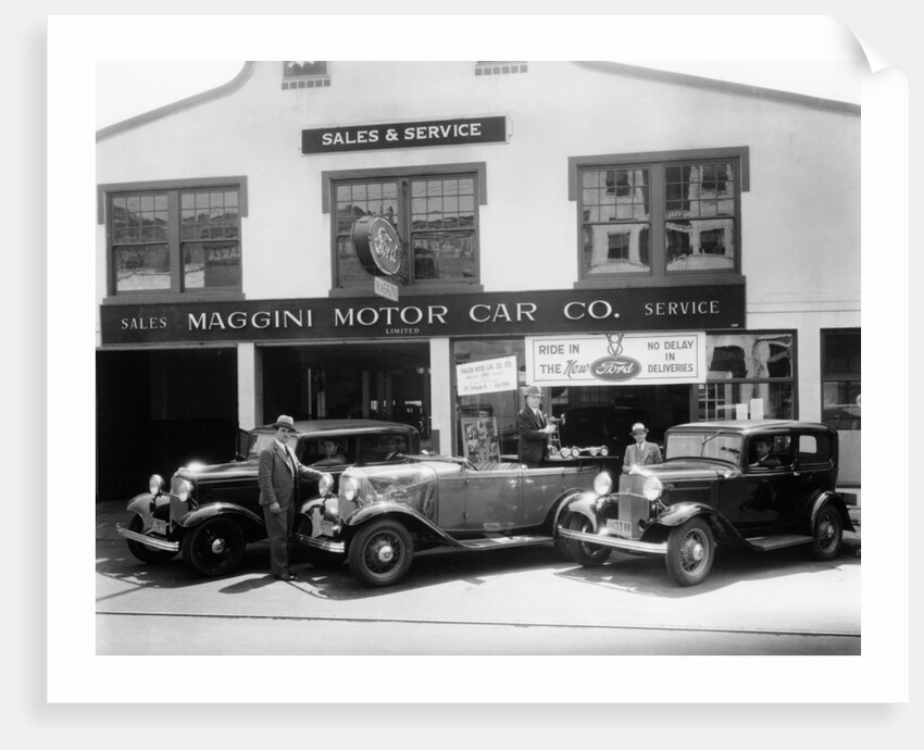 1932 Ford V8 in front of a car showroom, (c1932?) by Unknown