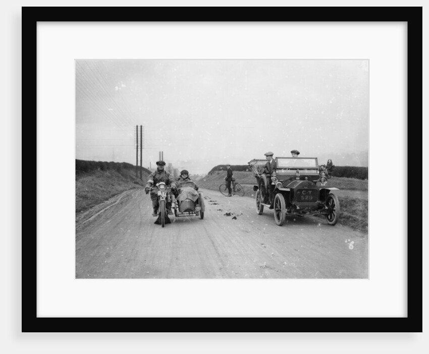 A motorcycle and sidecar passing a car and cyclist on the road by Unknown