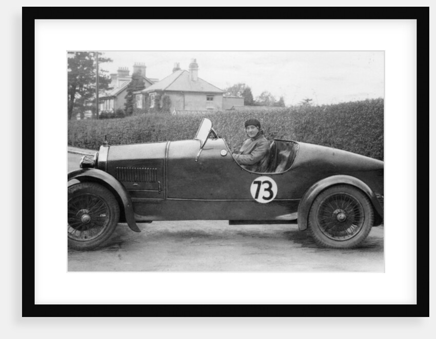 Amy Way seated in a racing car by Unknown