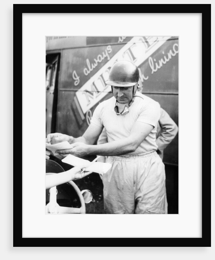 Ken Wharton signing autographs by Unknown