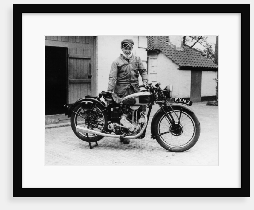 Donald Campbell outside a garage at Headley Grove, Surrey, 1938 by Unknown
