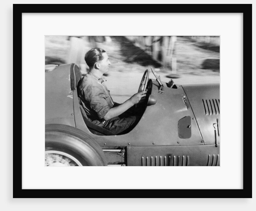 Alberto Ascari at the wheel of a racing car by Unknown